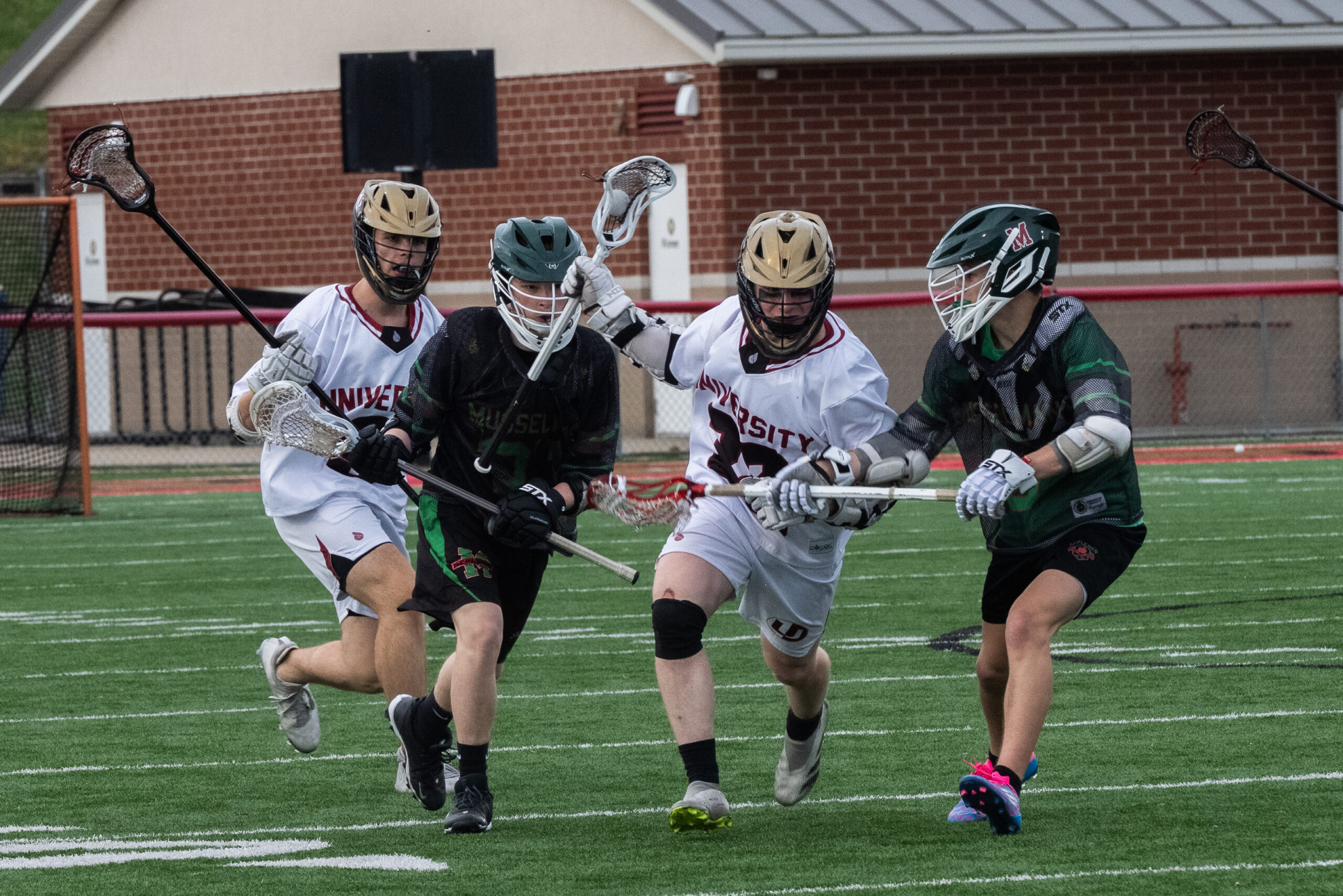 University boys lacrosse rolls past Musselman 18-1, continues to build momentum towards playoffs